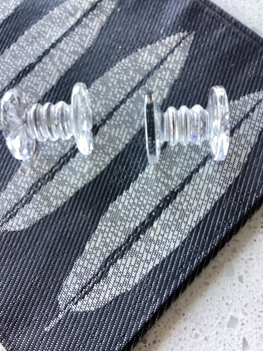 Two Waterford crystal knife rests.
